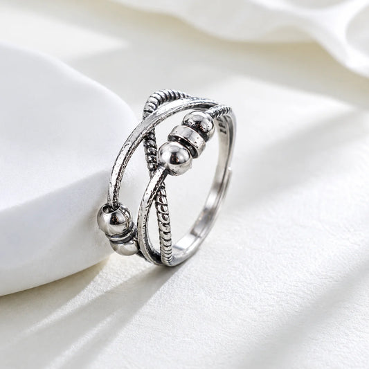 Cross Interwoven Fidget Ring with Moveable Beads